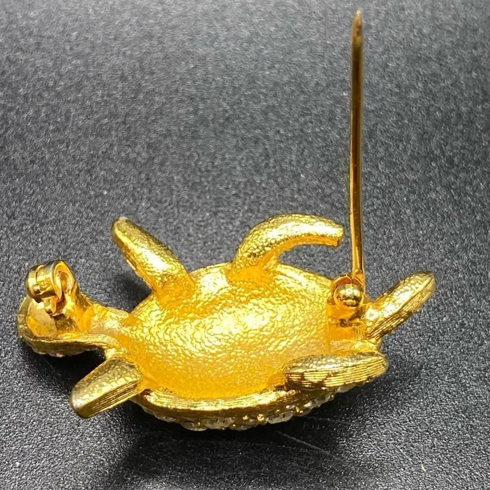 Gold tone rhinestone turtle tortoise pin brooch with green glass eyes gorgeous
